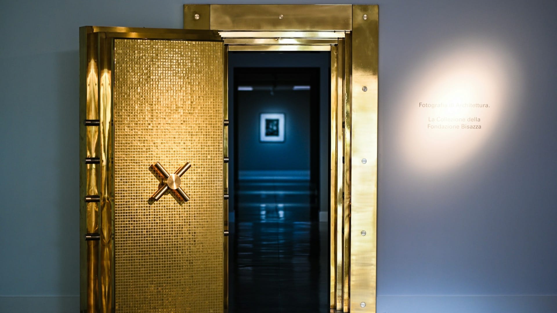 Open metal bank vault door, suggesting secured but inspectable storage