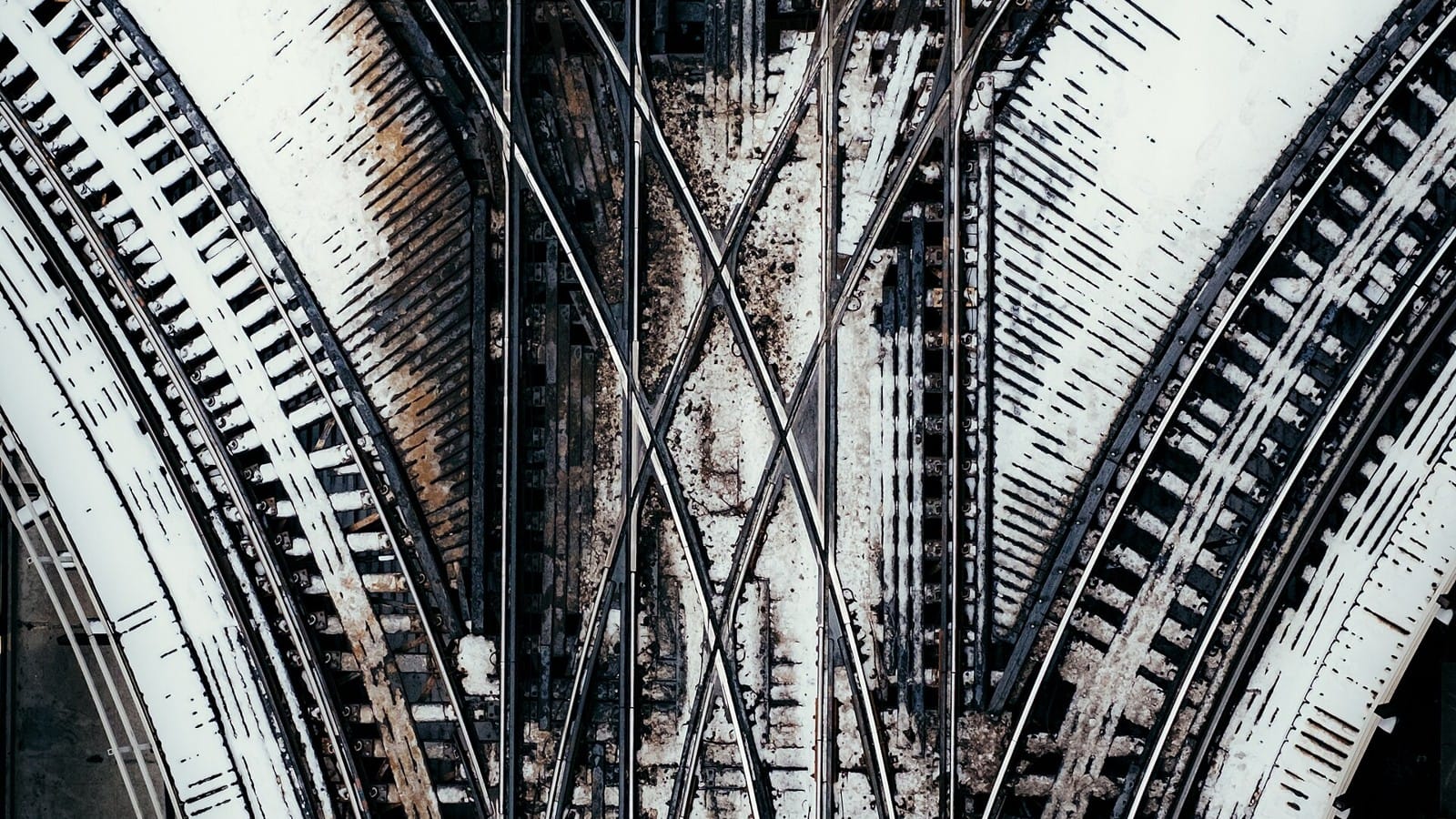 An overhead view of railway tracks converging at a junction in Chicago.